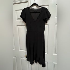 WHBM blk dress w neckline and bottom edge detail  Sz M Worn once